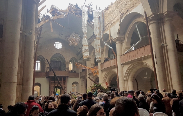 Den maronitiske kirke i Aleppo blev ødelagt af luftangreb. Men det afholdt ikke menigheden fra at fejre jul. Foto: UBS.